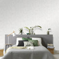 Wallpaper installed in a room showing its full pattern, color