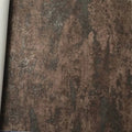 Wallpaper installed in a room showing its full pattern, color