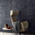 Wallpaper installed in a room showing its full pattern, color