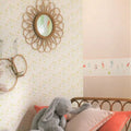 Wallpaper installed in a room showing its full pattern, color