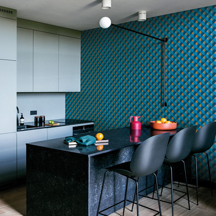 Geometric pattern with blue and brown triangles on a textured fabric background