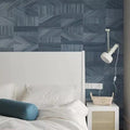 Wallpaper installed in a room showing its full pattern, color