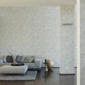 Wallpaper installed in a room showing its full pattern, color